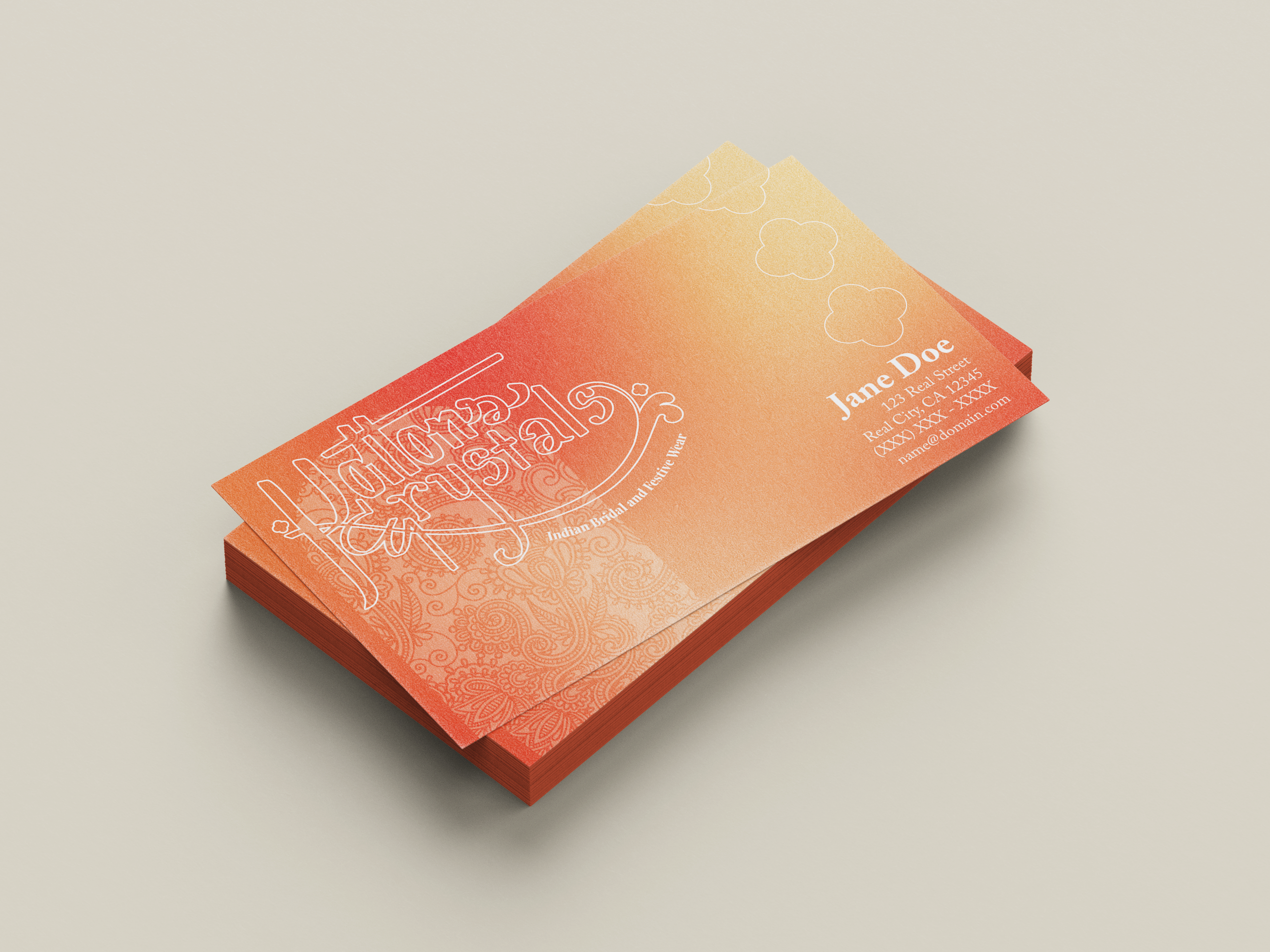 A mockup of a stack of Kottons and Krystals business cards